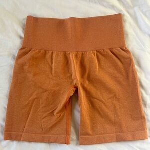NVGTN Women's Burnt Orange Mid Rise Seamless Shorts